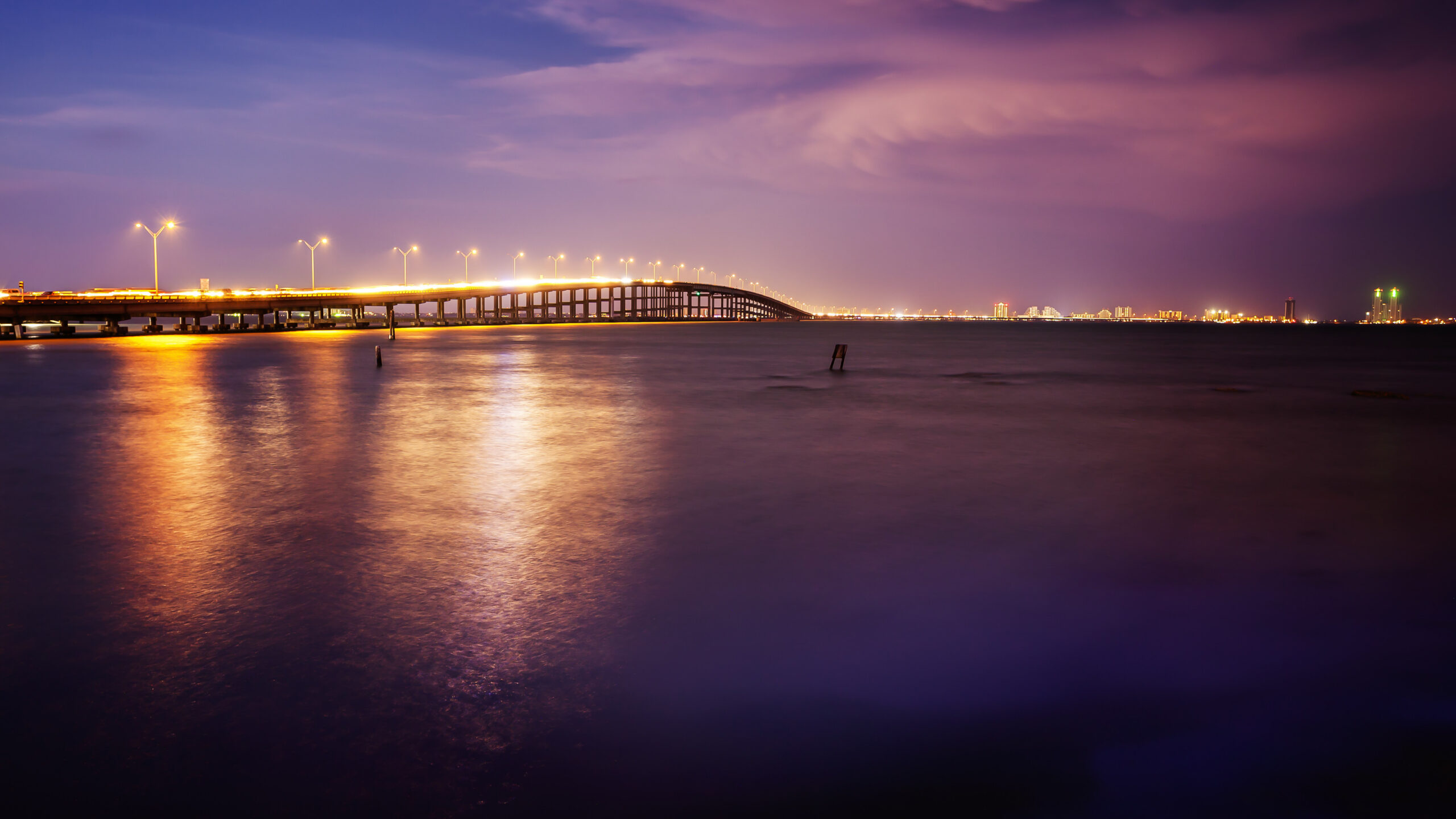 The Queen Isabella Causeway (bridge) leads to South Padre Island, Texas at sunset